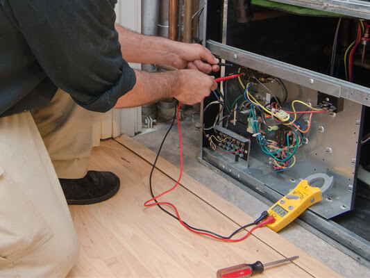 Man fixing electrical wirings