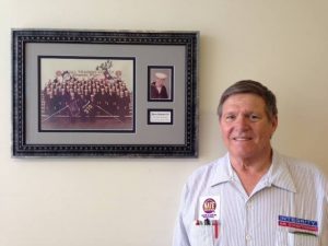 Integrity Air Conditioning Employee Standing Next to Picture