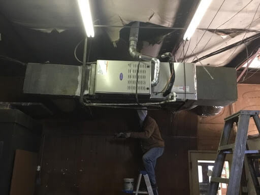 Man fixing furnace